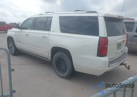2015 Chevrolet Suburban 1500 Ltz z USA, uszkodzony, nr VIN 1GNSCKKC9FR302420
